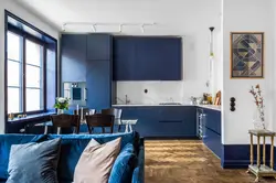 Blue sofa in the interior of the kitchen living room photo