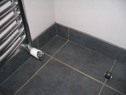 Baseboard For Bathroom Floor On Tiles Photo