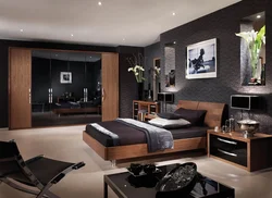 Интерьер спальни с черной мебелью фото