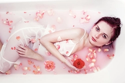 Photo In A Milk Bath With Flowers