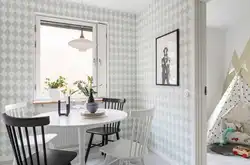 Checkered wallpaper in the kitchen interior