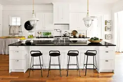 White kitchen with black table photo