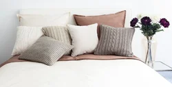 Photo of pillows in the bedroom interior photo