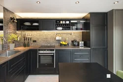 Beige Kitchen With Gray Countertop In The Interior