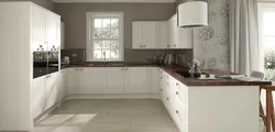White kitchen design with brown countertops