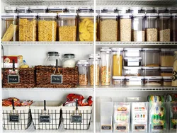 Organizing storage in the kitchen in cabinets photo