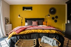 Mustard color in the bedroom interior