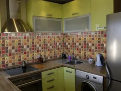 Kitchen design with self-adhesive panels