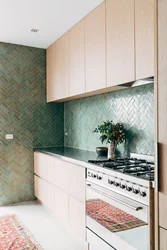 Kitchen covered in tiles up to the ceiling photo