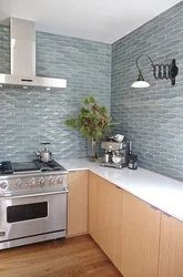 Kitchen Covered In Tiles Up To The Ceiling Photo