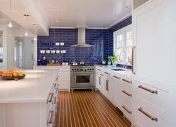 Kitchen Covered In Tiles Up To The Ceiling Photo