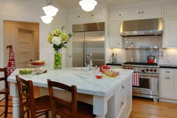 Artificial flowers in the kitchen interior