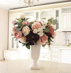Artificial flowers in the kitchen interior