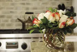 Artificial flowers in the kitchen interior