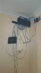 Hide the router in the hallway like on the wall photo