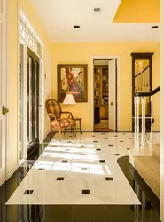 Photo of floors in the hallway and kitchen made of porcelain stoneware