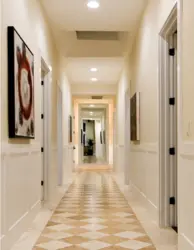 Photo of floors in the hallway and kitchen made of porcelain stoneware