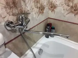 Faucet In The Wall In The Bathroom Photo