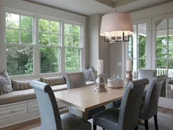 Table In The Living Room By The Window In The Interior