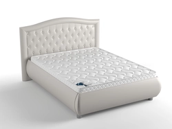 Double bed with mattress photo