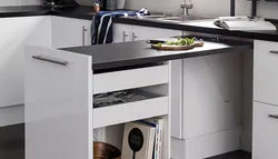 Small Kitchen With Pull-Out Table Photo