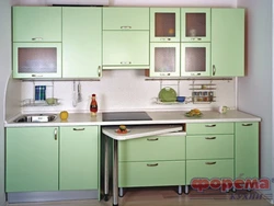 Small Kitchen With Pull-Out Table Photo