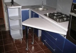 Small Kitchen With Pull-Out Table Photo