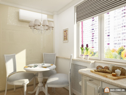 Kitchen design with sofa and table by the window