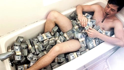 In The Bathroom With Money Photo