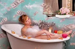 In The Bathroom With Money Photo