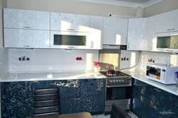 White metallic kitchen in the interior