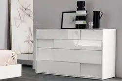 White long chest of drawers in the living room photo