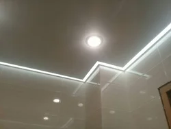 Light lines on a suspended ceiling photo in the bath