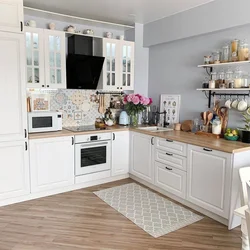 Aprons for white kitchen interior photo