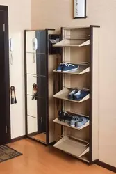 Hallway with a large shoe rack photo