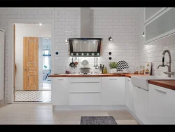 Kitchen interior with white tiles photo