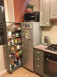 Kitchen design with sink next to refrigerator