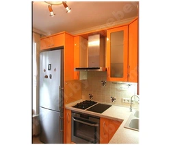 Small kitchen design photo corner with gas