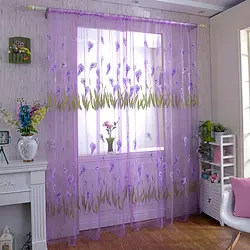 Tulle with flowers in the bedroom interior