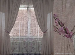 Tulle with flowers in the bedroom interior