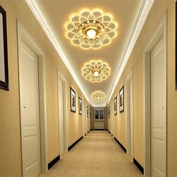 Suspended ceilings in the long corridor of the apartment photo