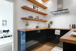 Photo Of A Corner Kitchen With Open Shelves