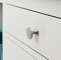 Button Handles In The Kitchen In The Interior