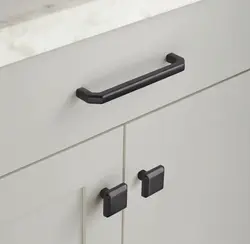 Button Handles In The Kitchen In The Interior