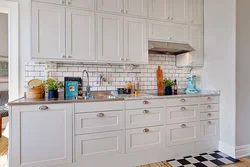 Button handles in the kitchen in the interior