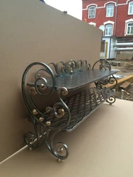 Forged shoe rack in the hallway photo