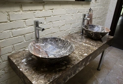 Bathroom sinks made of stone photo