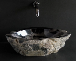 Bathroom sinks made of stone photo