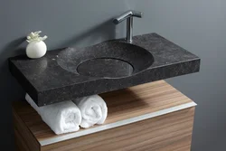 Bathroom sinks made of stone photo