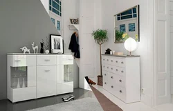 Chest of drawers in the hallway with a mirror in a modern style photo